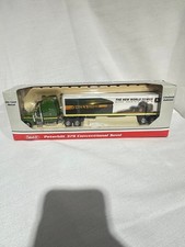 John Deere 9000 Series 4WD's Peterbilt 379 Semi By SpecCast 1/64th Scale