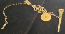 Carter, Qvarnstrom & Remington, watch chain with "Bloodstone" key and locket