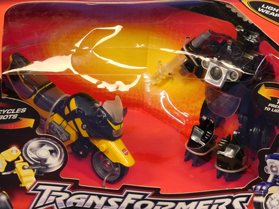 TRANSFORMERS RID SIDEWAYS VS AXER 2001 SEALED IN ROUGH BOX HASBRO