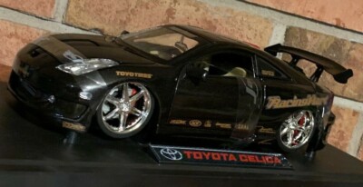 TOYOTA CELICA BLACK IMPORT RACER 1:18 SCALE DIE-CAST  BY JADA BRAND NEW