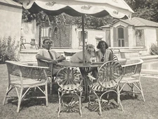 1930s Woman Petting Cute Dog Sitting on Table by Swimming Pool Man Photo P14zc20