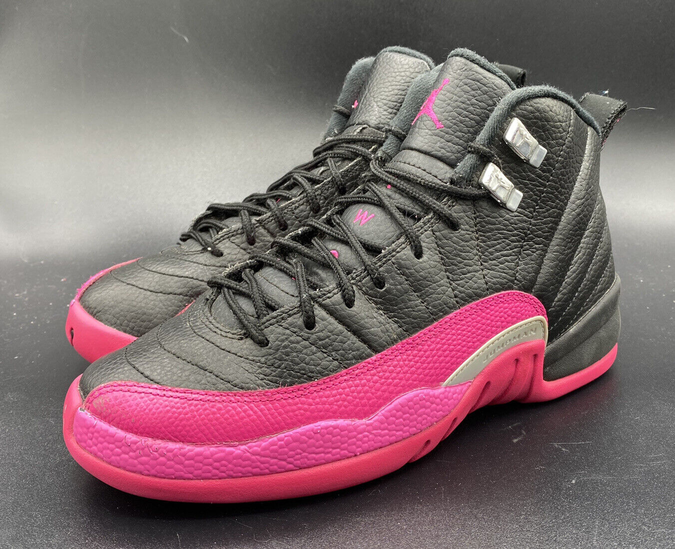 pink and black jordans 12