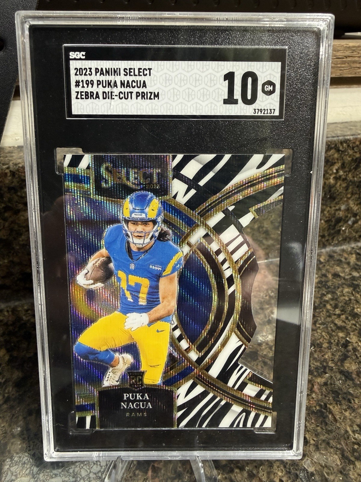 2023 Panini Select - Premier Level Puka Nacua #199 Zebra Prizm Die-Cut (RC)