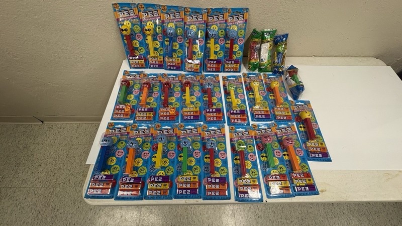 PEZ  Funky Faces. 27 assorted  See pic. 4 in bags rest on cards