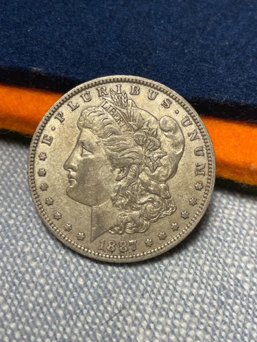 (#101618) Morgan Dollar: 1887 O.  AU.  Better date.  (See video)