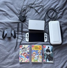 Nintendo Switch OLED Model With 3 Games + carrying case 