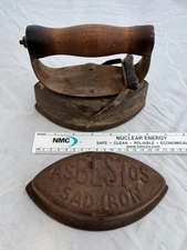 Antique "Asbestos" brand sad iron with a detachable wooden handle