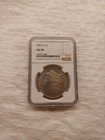 1885-O MORGAN SILVER DOLLAR NGC AU58