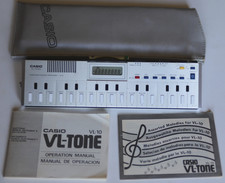 Mini orgue CASIO VL-10 fonctionnel avec housse et documentations