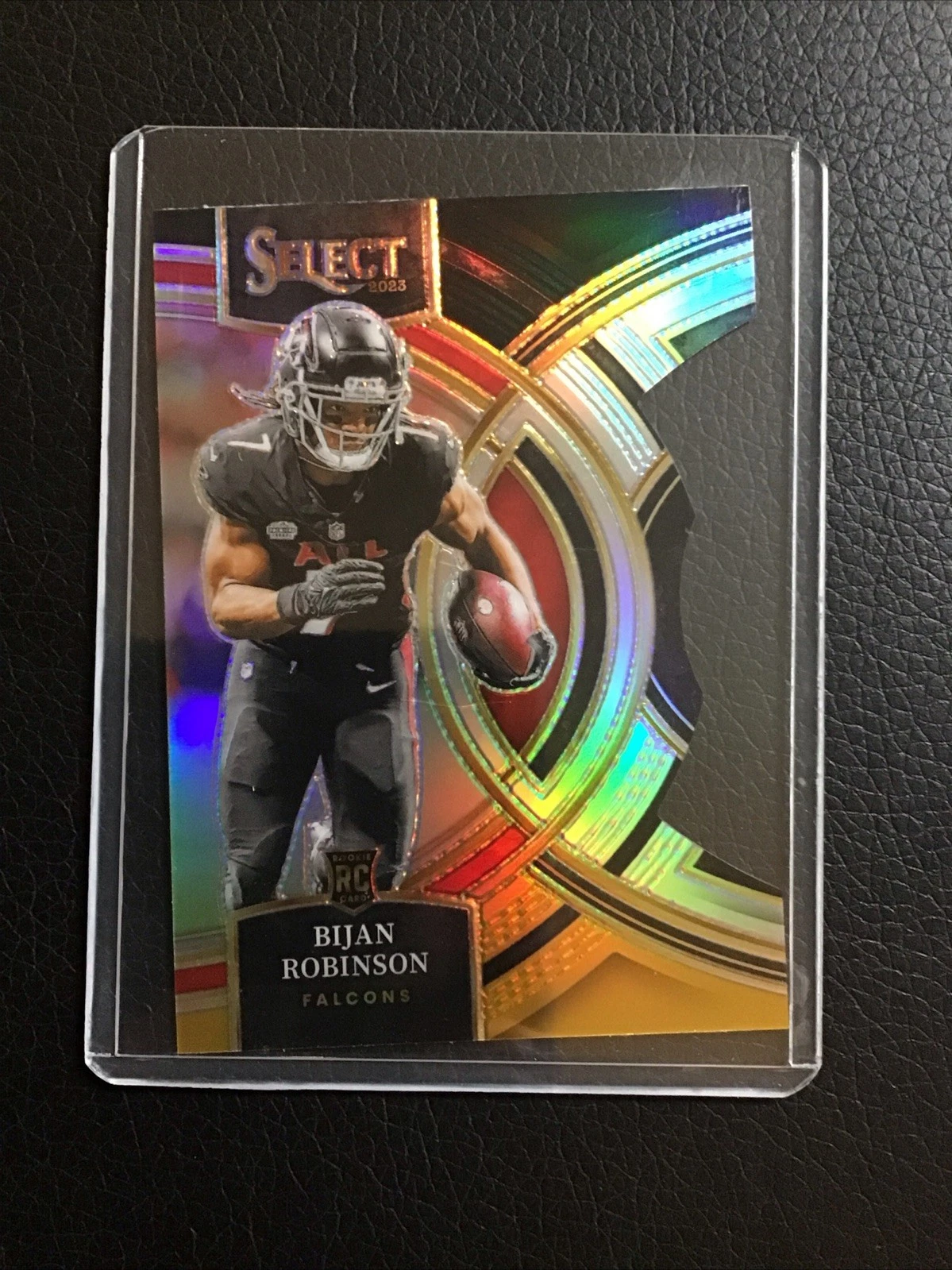 2023 Panini Select - Bijan Robinson #180 Black & Gold Prizm Die-Cut (RC)