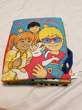 Let's get dressed! cloth book practice buckling, tying, snapping etc.