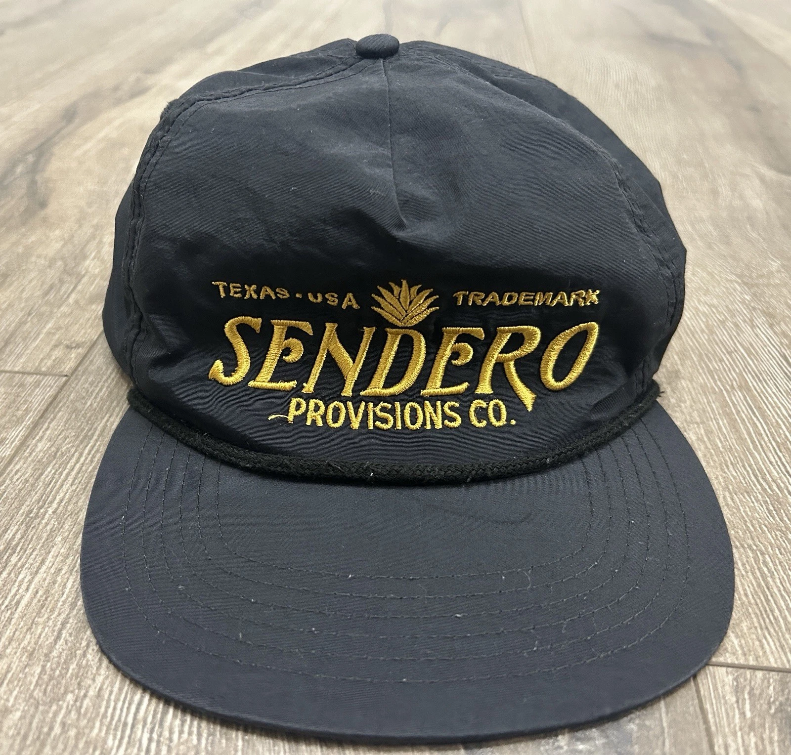 Sendero Provisions Co. Logo Graphic Black & Gold Cap Hat SnapBack Rope