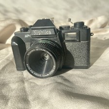 Nishika MF-3 35mm Film Camera w/Auto Fix Focus 50mm F/6 Lens UNTESTED 1980s