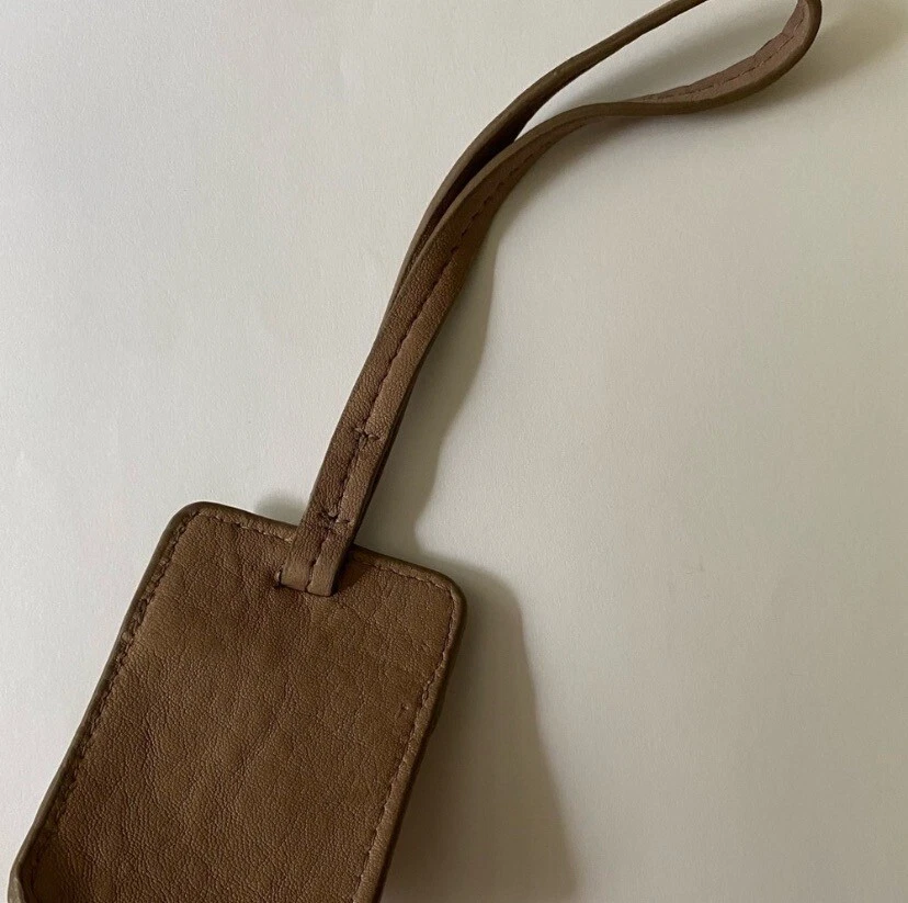 Estuche/muñequera de cuero para auriculares nuevos Foto 3 de 3