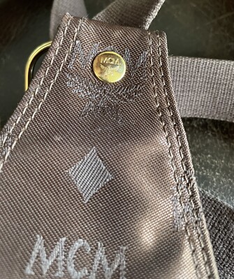 Vintage. MCM Brown Logo NylonDrawstring Monogram Sling Backpack with Gold Plaque Vintage MCM ~ Brown Logo Nylon Drawstring Sling Backpack Bag  main image 3