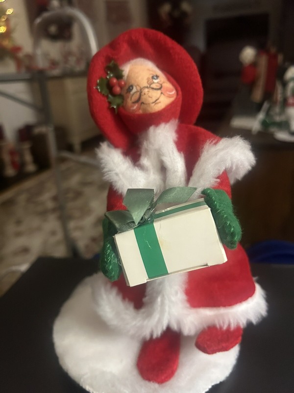 This is a 1996 Annalee  8" Mrs. Claus  Holding Gift Christmas Doll