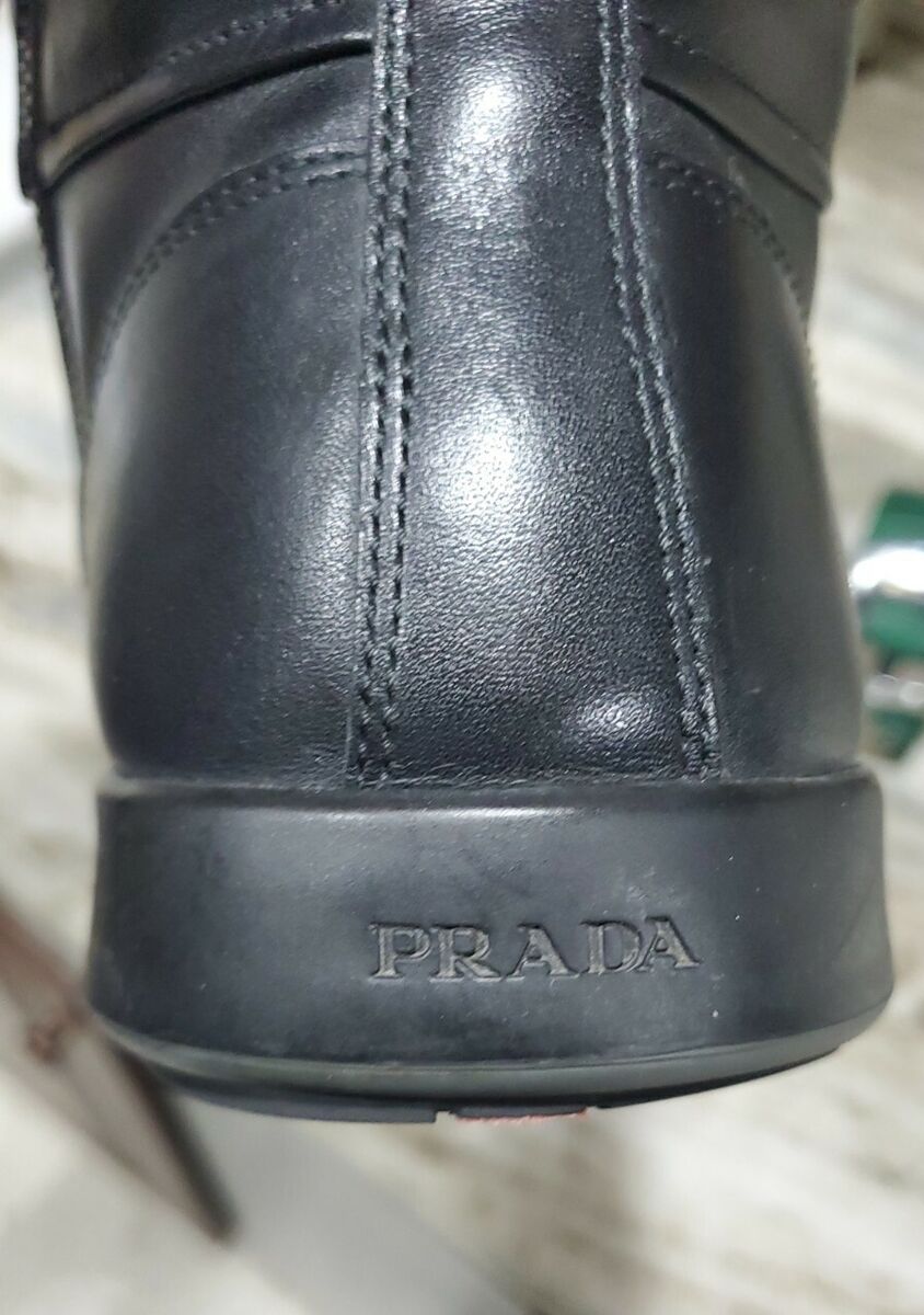 AUTHENTIC LUXURY PRADA HIGH-TOP BLACK LEATHER SNEAKERS MODEL AUTHENTIC LUXURY PRADA HIGH-TOP BLACK LEATHER SNEAKERS MODEL