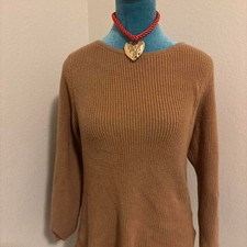 Tan long sleeve sweater with a relaxed
