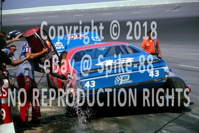 RICHARD PETTY STP 43 CAR BEING REFUELED UP DURING PIT STOP 1973