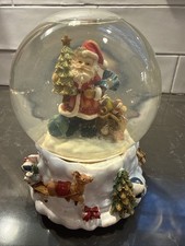 Santa Snow Globe Musical -  Silent Night  . Santa holding Gift Bag And Tree