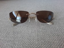 Silhouette Rimless Sunglasses Model 8085 Color Gold Pearl Ceramic Polarizd LNS