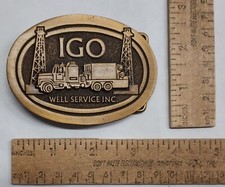 IGO WELL SERVICE INC. - belt BUCKLE - listing 7181