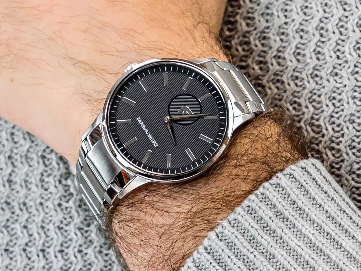 New Emporio Armani Men s Black Dial Rotating Logo Silver Tone