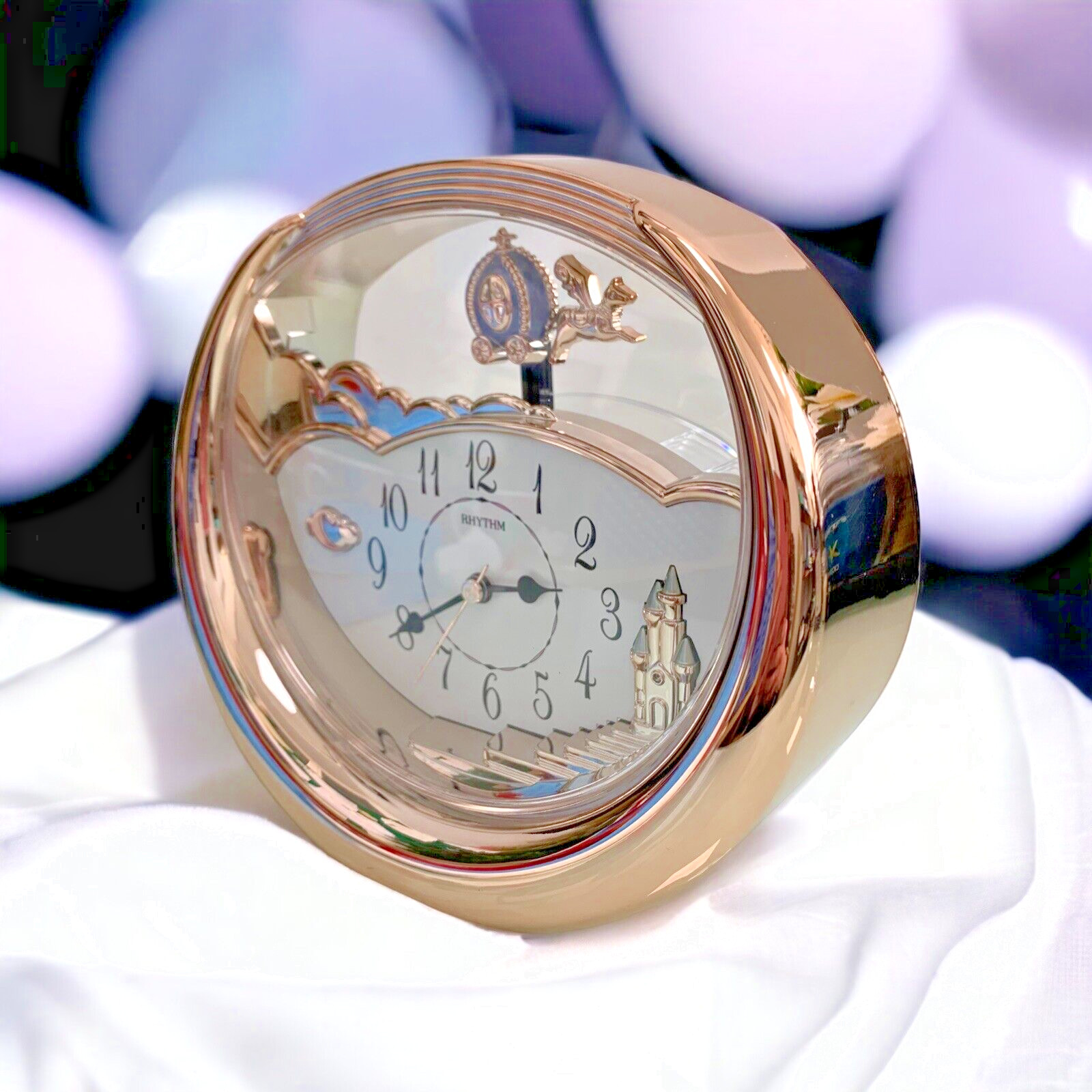 Rhythm Mantel Clock Rose Gold Colour Flying Carriage Pendulum Quartz 4SG719WD13