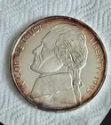 8 Troy ounces Jefferson nickel. 999  silver , 3.5 inch diameter