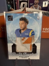 2024 Panini Donruss Rookie Holiday Sweaters Blake Corum #RHS-BCO (MEM, RC)