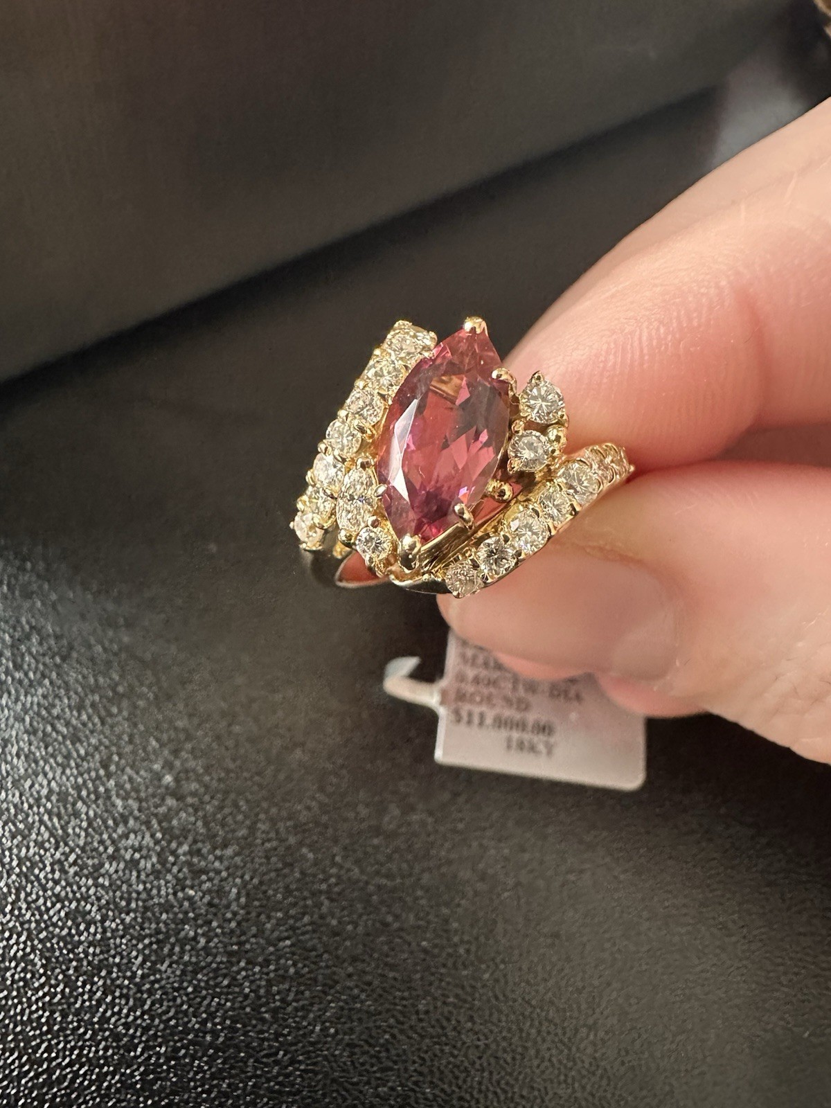 1.84 natural carats of pink tourmaline and 0.69 natural diamonds ring