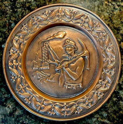 Vintage 12  Round Copper Wall Decor Plate Oil Derrick Man W/ Pickaxe Mine Miner