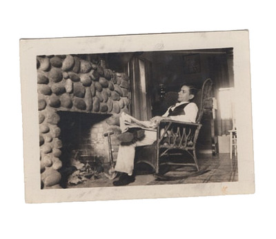 1930s Man Reading Newspaper by Stone Fireplace Vintage Photo