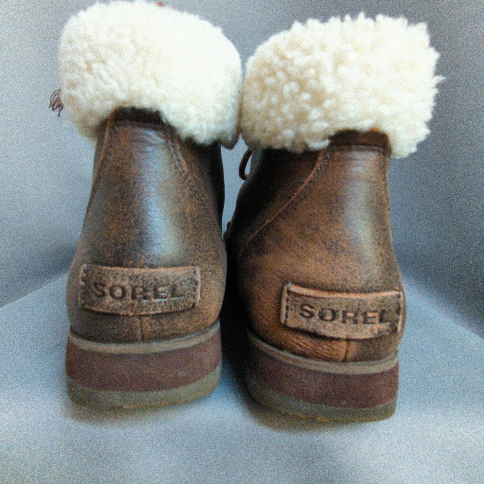 sorel harlow cozy distressed lace boots