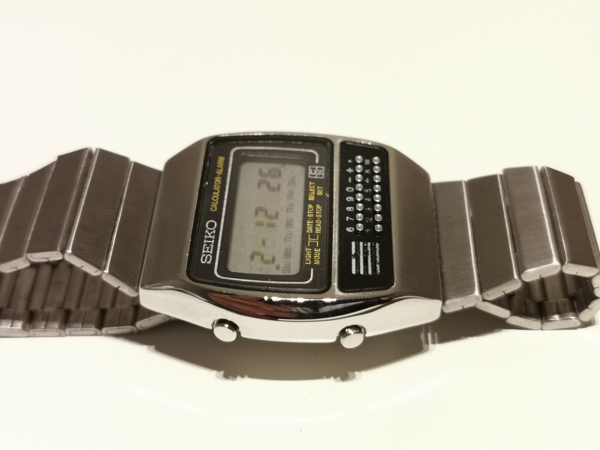 VINTAGE EARLY MEN'S STAINLESS STEEL CALCULATOR ALARM WATCH VINTAGE EARLY MEN'S STAINLESS STEEL CALCULATOR ALARM WATCH