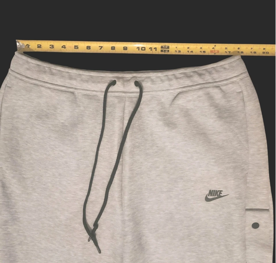Pantalones deportivos para hombre Nike Tech polar gris jaspeado/negro talla XLarge Foto 3 de 4