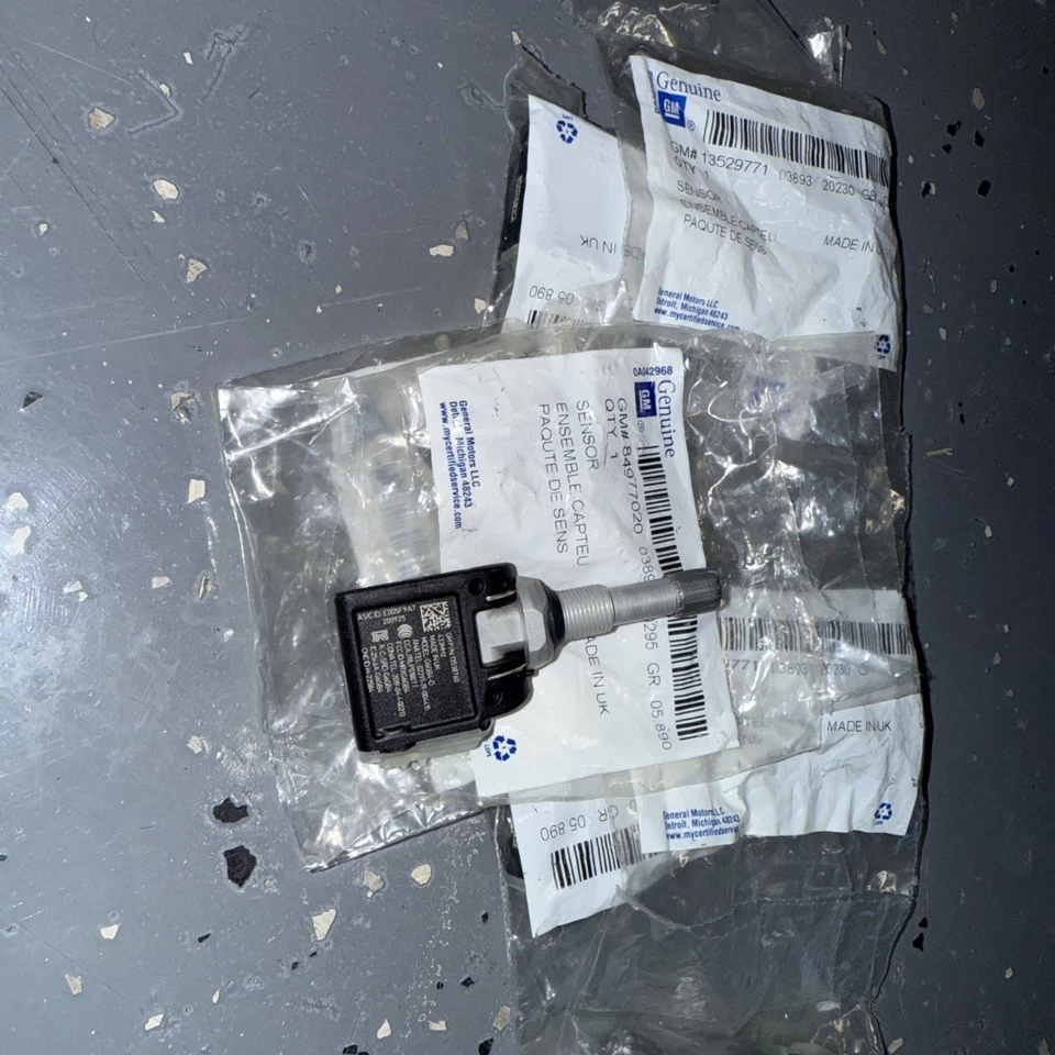 Датчик системы контроля давления в шинах OEM новый 22-25 Cadillac Chevrolet 84977020 - Изображение 4 из 4