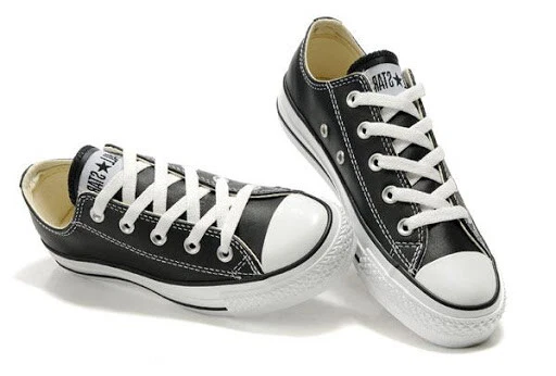 CONVERSE All Star Nere Basse classiche in pelle suola bianca