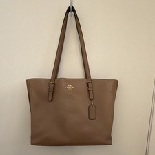 Coach Beige Pebbled Shoulder Bag with Logo, Tag Accent, Zipper, Inner Pockets