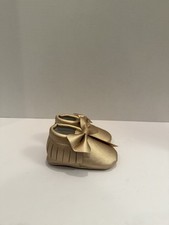 Gold baby moccasins size 4 12-18 months