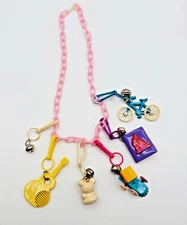 Vintage 80s Plastic Clip On Bell Charm Necklace 5 Charms Pink Chain READ