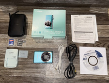 Canon Powershot SD1200 IS Digital ELPH Blue Compact Camera Includes OEM Battery