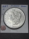1883-O $1 Morgan Silver Dollar with Good Luster