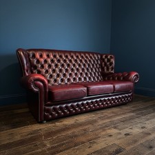 Vintage Oxblood Leather Chesterfield 3 seater Wingback Sofa, 1960s, Castors