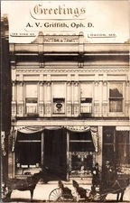 1909 Macon Missouri Optometrist A.V. Griffith Patton & Truitt Storefront  RPPC