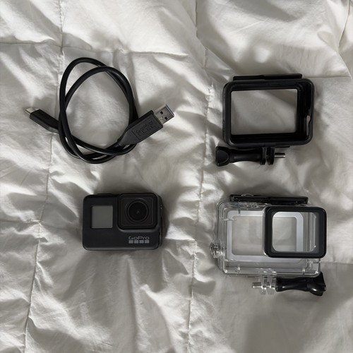 GoPro Hero 7 Black Action Camera with Regular and Waterproof Case and Cord