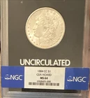 1884-CC GSA Hoard Morgan Silver Dollar OGP/COA- NGC MS64