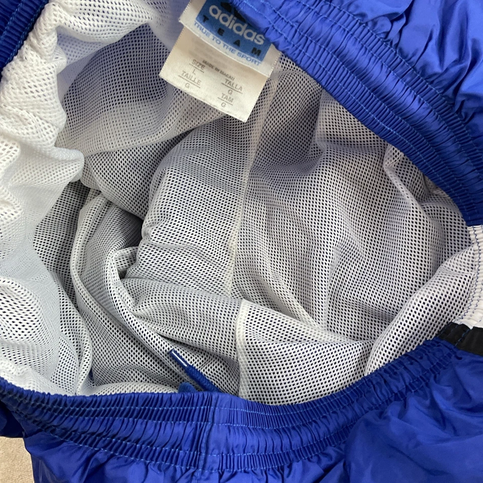 Pantalones deportivos Adidas Winbreakers vintage forrados de malla azul blanco años 90 para hombre talla L logotipo Foto 3 de 4