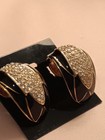 ELEGANT CINER GOLD PLATED PAVE CRYSTAL RHINESTONE BLACK ENAMEL CLIP EARRINGS — photo 1
