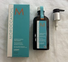 New In Box, Sealed W/pump Moroccan Oil LIGHT- Oil Treatment 3.4 Fl Oz